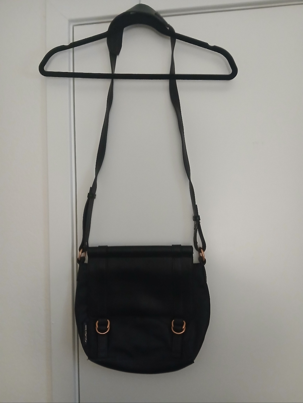 Calvin Klein Black Crossbody Saddle Bag with Rose-Gold Hardware